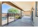 Inviting covered patio overlooking private backyard oasis with pool, landscaping, and ample seating at 2762 E Clifton Ave, Gilbert, AZ 85295
