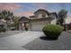 Beautiful two-story home featuring desert landscaping, and a spacious three car garage at 2762 E Clifton Ave, Gilbert, AZ 85295