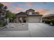Charming two-story home boasts a stone facade, covered porch, and well-maintained landscaping at 2762 E Clifton Ave, Gilbert, AZ 85295