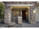 Inviting front porch with stone columns, offering curb appeal at 2762 E Clifton Ave, Gilbert, AZ 85295