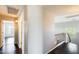 Upstairs hallway with wood floors and a staircase leading to another level at 2762 E Clifton Ave, Gilbert, AZ 85295