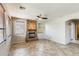 The living room has tile floors, a ceiling fan, and a stone fireplace with many windows at 2762 E Clifton Ave, Gilbert, AZ 85295