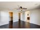 Primary bedroom with ensuite bathroom, closet, and ceiling fan at 2762 E Clifton Ave, Gilbert, AZ 85295