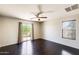 Large primary bedroom with natural light, balcony access, and a ceiling fan at 2762 E Clifton Ave, Gilbert, AZ 85295