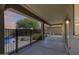 Covered patio overlooking fenced pool area, providing a perfect space for relaxation and outdoor entertaining at 2762 E Clifton Ave, Gilbert, AZ 85295