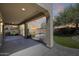 Spacious covered patio view features a pool and landscape. Perfect for outdoor entertaining and relaxation at 2762 E Clifton Ave, Gilbert, AZ 85295