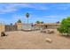 Spacious backyard featuring a pool, covered patio, and a low-maintenance desert landscape at 301 N 87Th St, Mesa, AZ 85207