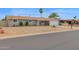 Exterior of the home featuring desert landscaping with charming shrubs and trees at 301 N 87Th St, Mesa, AZ 85207