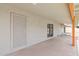 Covered patio offering ample space for outdoor seating and entertainment, seamlessly connecting indoor and outdoor living at 301 N 87Th St, Mesa, AZ 85207
