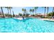 Soak up the sun at this luxurious community swimming pool with ample lounge chairs at 3301 S Goldfield Rd # 1046, Apache Junction, AZ 85119