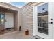 Inviting entrance featuring white doors, neutral siding, and decorative accents at 3301 S Goldfield Rd # 1046, Apache Junction, AZ 85119