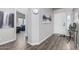 Welcoming foyer featuring wood-look floors, a modern aesthetic, and ample natural light at 3301 S Goldfield Rd # 1046, Apache Junction, AZ 85119