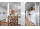 Open kitchen with breakfast bar and natural lighting, perfect for socializing and gatherings at 3301 S Goldfield Rd # 1046, Apache Junction, AZ 85119