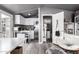 Well-lit kitchenette with modern appliances, and an adjacent seating area at 3301 S Goldfield Rd # 1046, Apache Junction, AZ 85119