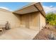 Enclosed patio with ample space for outdoor seating and a convenient entry door at 3301 S Goldfield Rd # 1046, Apache Junction, AZ 85119