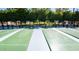 Enjoy a game of shuffleboard on the community shuffleboard courts at 3301 S Goldfield Rd # 1046, Apache Junction, AZ 85119