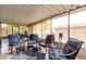 Relaxing sunroom with comfortable seating, views of the garden, and abundant natural light at 3301 S Goldfield Rd # 1046, Apache Junction, AZ 85119