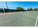 Enjoy the outdoors with a game of tennis on a well-kept court at 3301 S Goldfield Rd # 1046, Apache Junction, AZ 85119