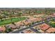 Aerial view of home, neighborhood, and golf course at 3702 N 160Th Ave, Goodyear, AZ 85395