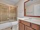 Bathroom featuring a vanity with sink, toilet, and tiled shower/tub combo at 3702 N 160Th Ave, Goodyear, AZ 85395