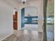 An elegant foyer with tiled flooring, arched entryways, and a view into the spacious living area at 3702 N 160Th Ave, Goodyear, AZ 85395