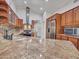Beautiful kitchen featuring granite countertops, stainless steel appliances, and custom cabinetry at 3702 N 160Th Ave, Goodyear, AZ 85395