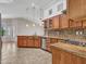 Spacious kitchen features modern stainless appliances, granite countertops, and decorative backsplash at 3702 N 160Th Ave, Goodyear, AZ 85395