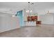 Spacious living area with great lighting that leads to an open space at 3702 N 160Th Ave, Goodyear, AZ 85395