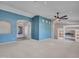 Expansive living space featuring archways, neutral walls, and a smooth transition into other areas of the home at 3702 N 160Th Ave, Goodyear, AZ 85395