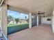 Covered patio offers outdoor seating and shade with ceiling fans and view of well-maintained yard at 3702 N 160Th Ave, Goodyear, AZ 85395