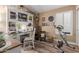 Bright office with a built-in desk, shutters, and wood-look floors, ideal for a home office at 38560 N Joann Way, San Tan Valley, AZ 85140