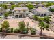 Wide aerial view of an expansive backyard featuring a low maintenance landscaping design at 40232 W Marion May Ln, Maricopa, AZ 85138