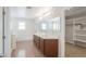 Bathroom features double sinks, ample storage, walk-in shower, and a closet at 40232 W Marion May Ln, Maricopa, AZ 85138