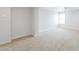 Spacious bedroom with carpet, neutral walls, and a window allowing natural light at 40232 W Marion May Ln, Maricopa, AZ 85138