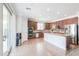 Spacious kitchen with stainless steel appliances, granite countertops, and a large center island at 40232 W Marion May Ln, Maricopa, AZ 85138