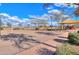 Community sand volleyball court and playground, encouraging outdoor fun and social interaction at 40232 W Marion May Ln, Maricopa, AZ 85138