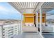 Relax on this covered balcony featuring a cozy daybed, with mountain views and city skyline backdrop at 4422 N 75Th St # 8004, Scottsdale, AZ 85251