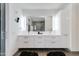 Bright bathroom with double sinks, a large mirror, and modern cabinetry, plus an open shower at 4422 N 75Th St # 8004, Scottsdale, AZ 85251