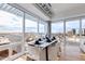Bright dining area featuring a modern table and chairs with expansive city views at 4422 N 75Th St # 8004, Scottsdale, AZ 85251