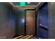 Hallway featuring modern design with the unit number displayed and a door to enter the condo at 4422 N 75Th St # 8004, Scottsdale, AZ 85251