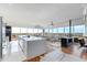 Bright, open living area with modern finishes, a fireplace, and floor-to-ceiling windows showcasing city views at 4422 N 75Th St # 8004, Scottsdale, AZ 85251