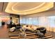A stylish living room with a modern fireplace, sleek furniture, and elegant lighting at 4422 N 75Th St # 8004, Scottsdale, AZ 85251