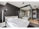 Luxurious bedroom with an open ensuite bathroom featuring glass shower and freestanding tub at 4422 N 75Th St # 8004, Scottsdale, AZ 85251