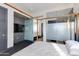 Spacious bedroom featuring a sliding glass door to ensuite bathroom at 4422 N 75Th St # 8004, Scottsdale, AZ 85251