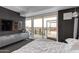 Contemporary bedroom featuring sleek furniture, city view and sliding glass doors at 4422 N 75Th St # 8004, Scottsdale, AZ 85251