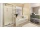 Bathroom showcases a separate shower, soaking tub, and neutral color palette at 4516 W Fortune Dr, Phoenix, AZ 85086