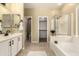 Spacious bathroom featuring dual sinks, soaking tub and separate shower at 4516 W Fortune Dr, Phoenix, AZ 85086
