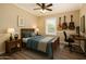 Cozy bedroom with natural light, desk, and guitar decor at 4516 W Fortune Dr, Phoenix, AZ 85086