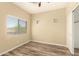 Bedroom with wood-look floors, a window, and neutral wall color at 4516 W Fortune Dr, Phoenix, AZ 85086