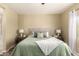 Inviting bedroom featuring a cozy bed, decorative pillows, and natural light at 4516 W Fortune Dr, Phoenix, AZ 85086